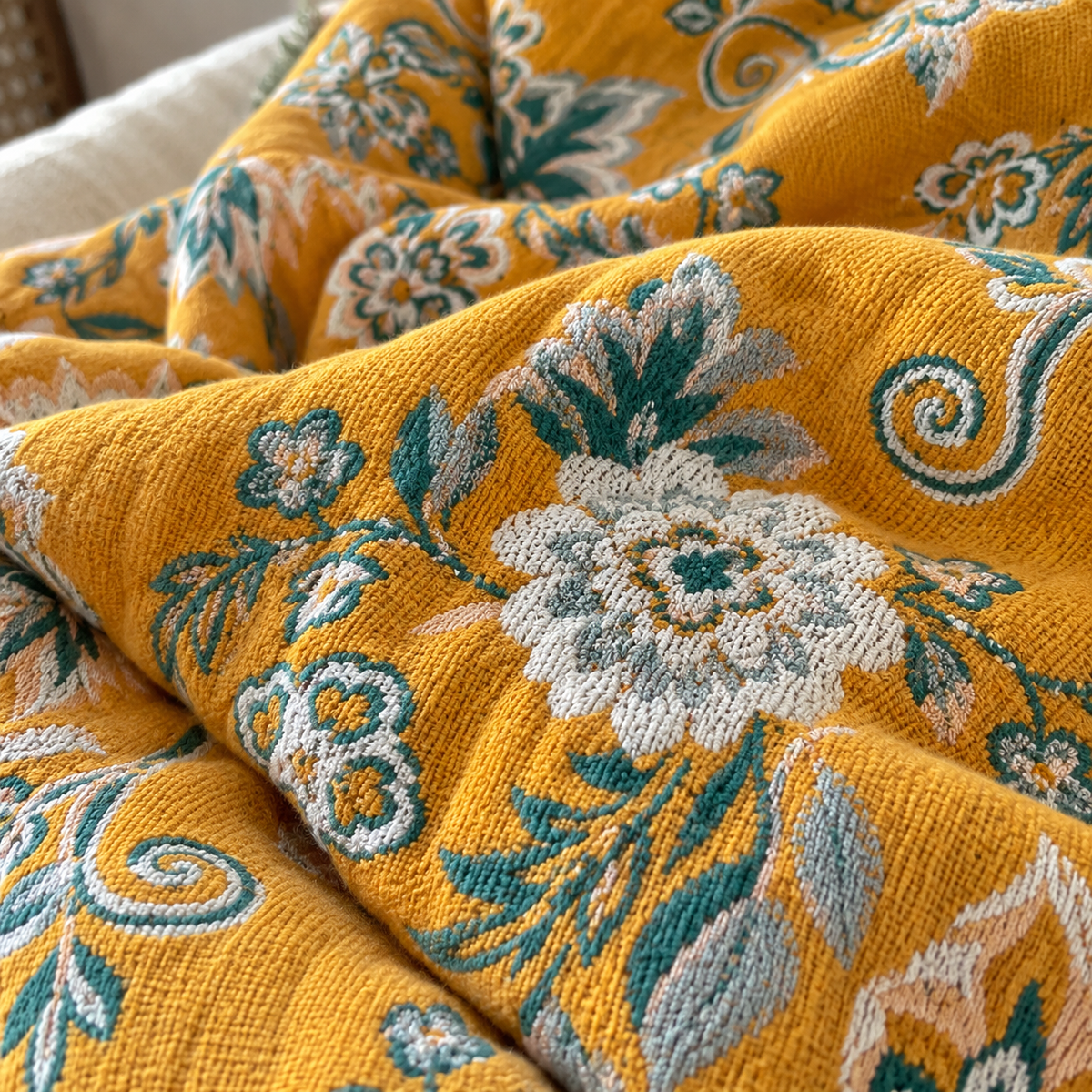 Close-up of the soft cotton gauze and woven flowers