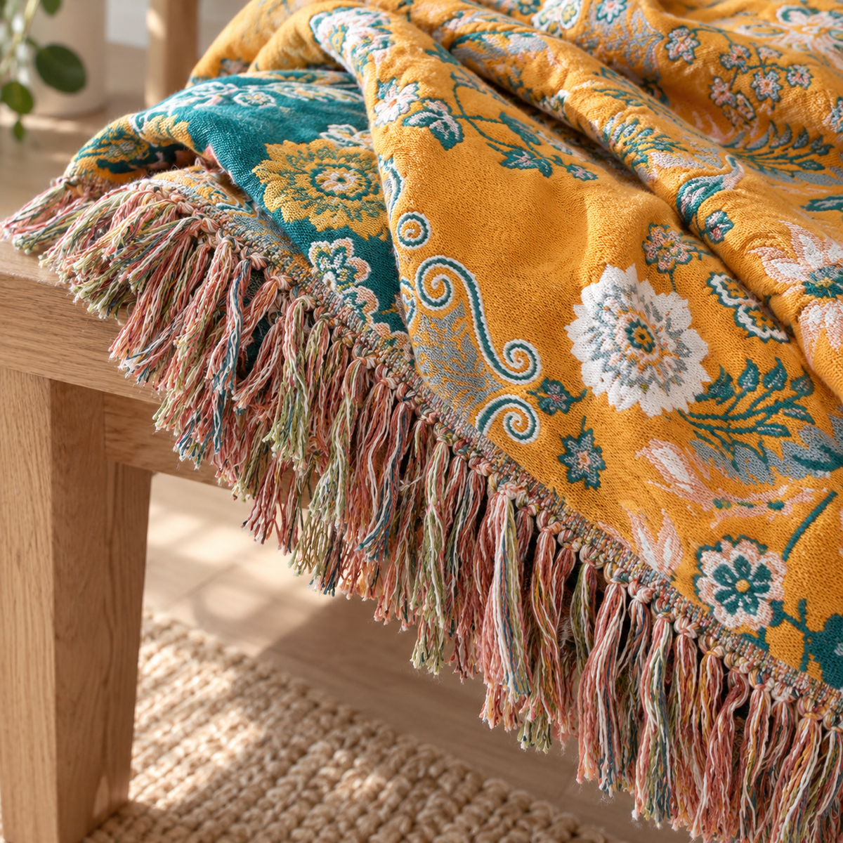 Fringe on the floral throw