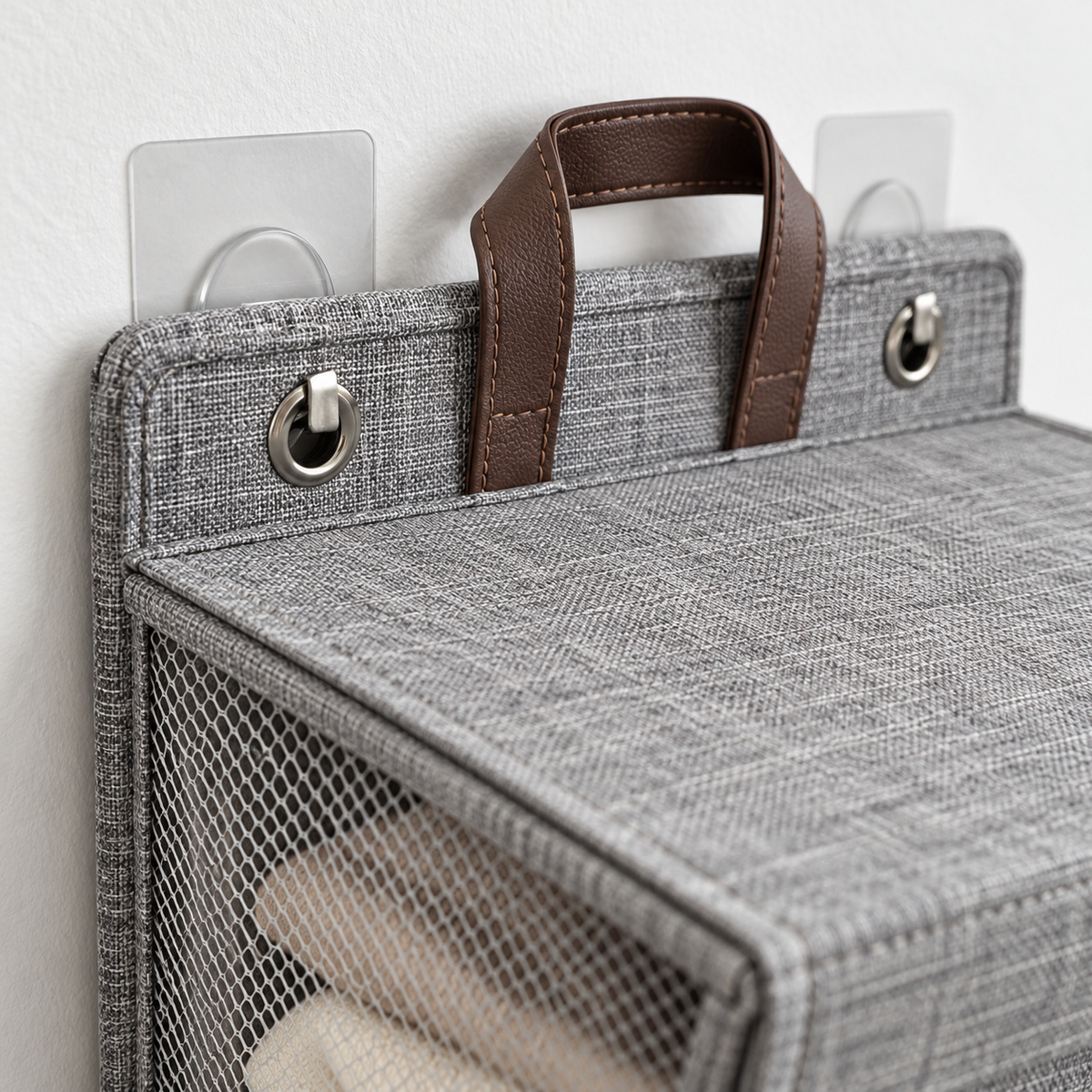 Close-up of the linen texture and mesh panel on the laundry hamper