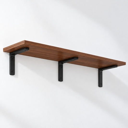 Walnut wall shelf with three black L-brackets on a white wall