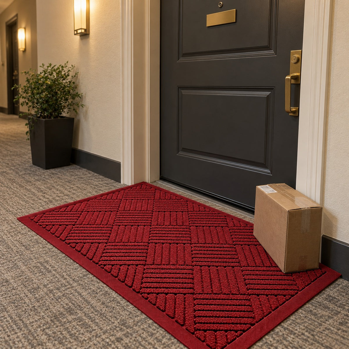 Red door mat outside an apartment door