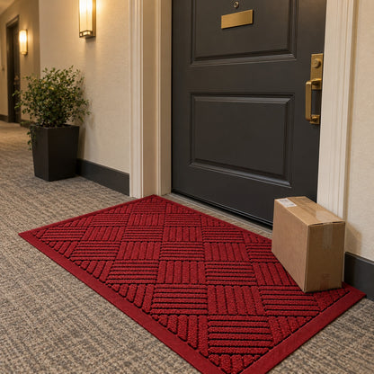 Red door mat outside an apartment door