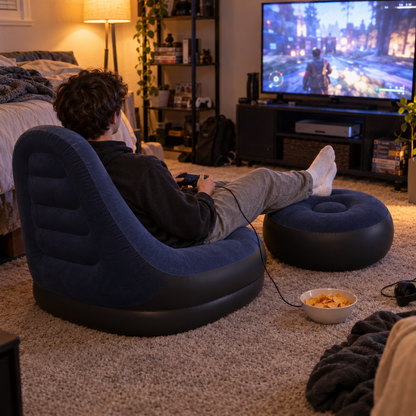 Navy blue inflatable lounge chair and ottoman in a gaming corner